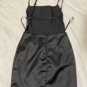 Aritizia Dress Cut out in the back in Black size Small